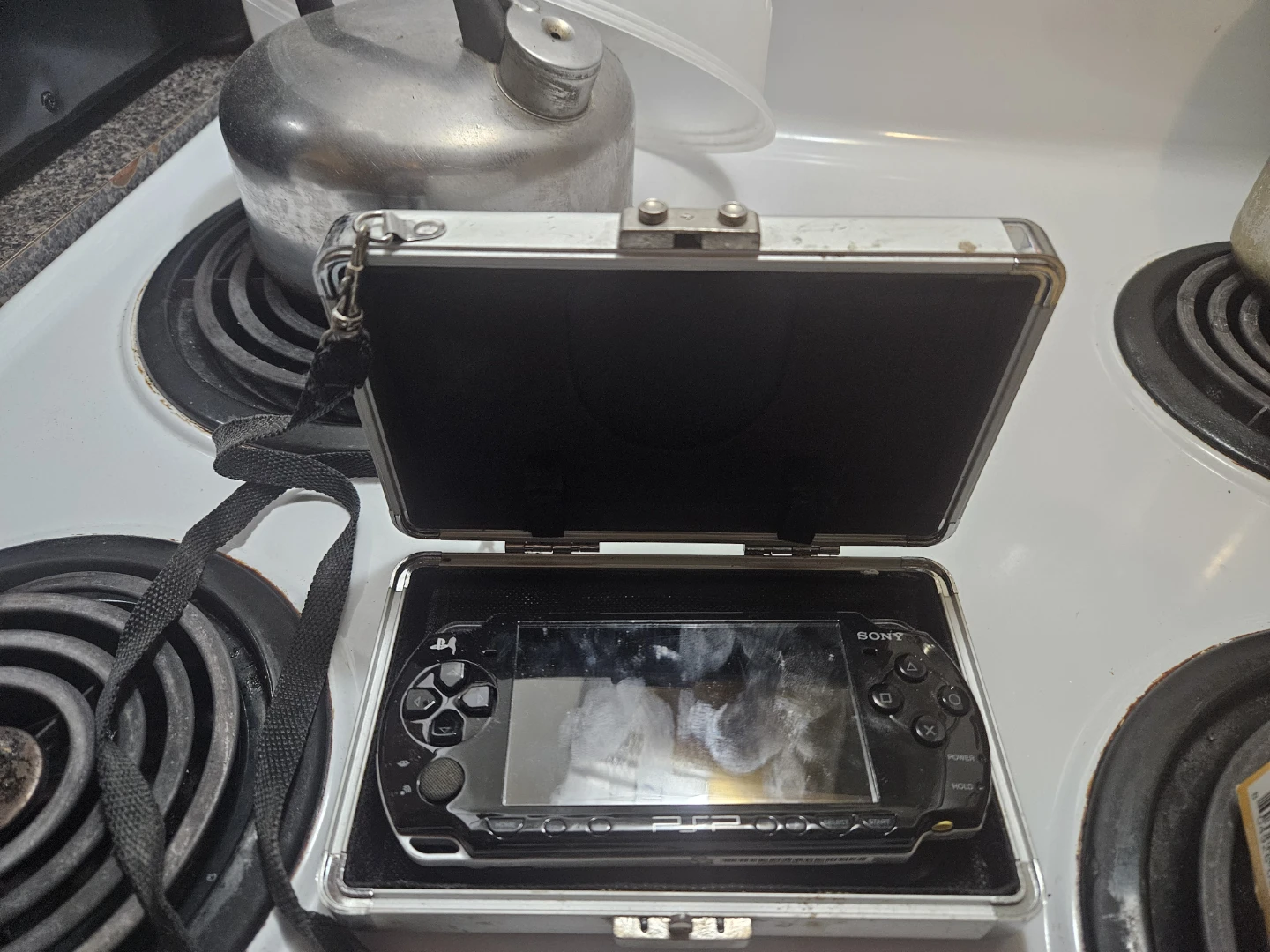 Sony PSP 3000 in hard case with charger