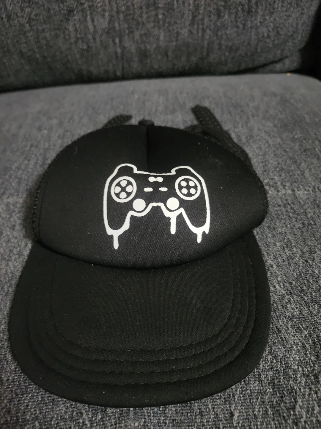 Black Trucker Hat with Gaming Controller Design