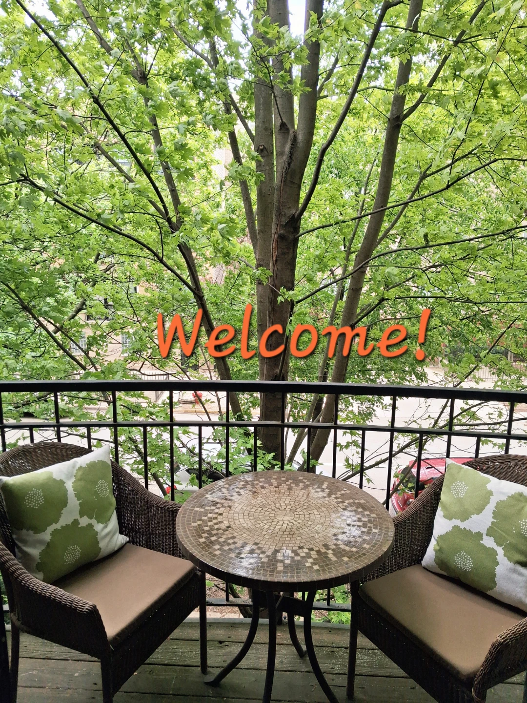 Wicker patio chairs and mosaic table set
