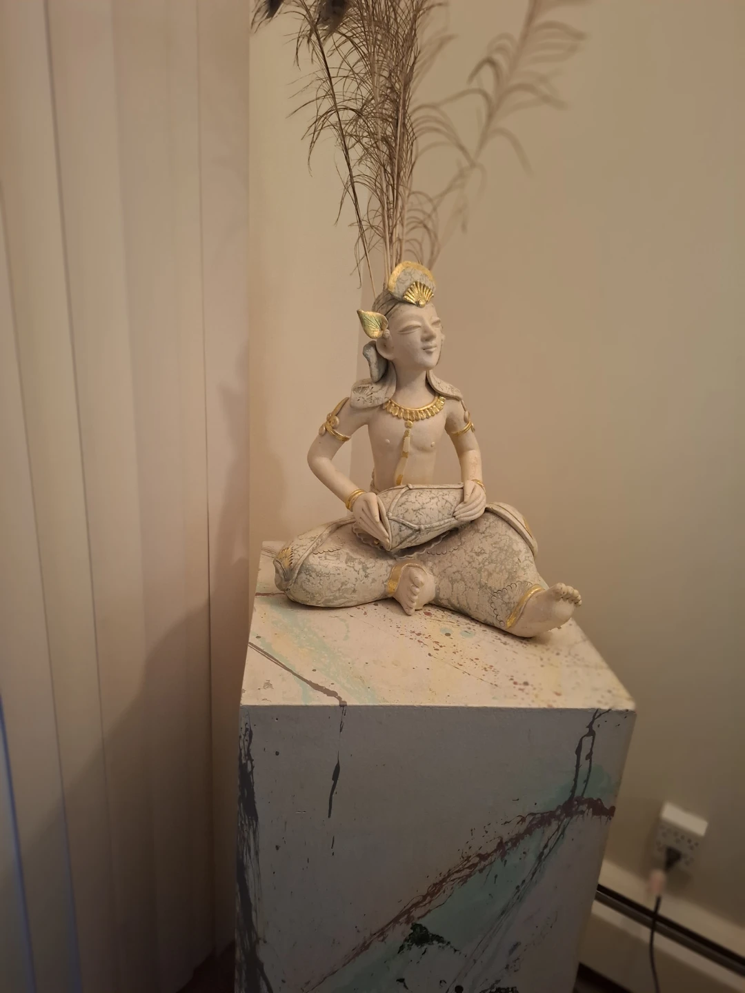 Decorative Figurine with Peacock Feathers