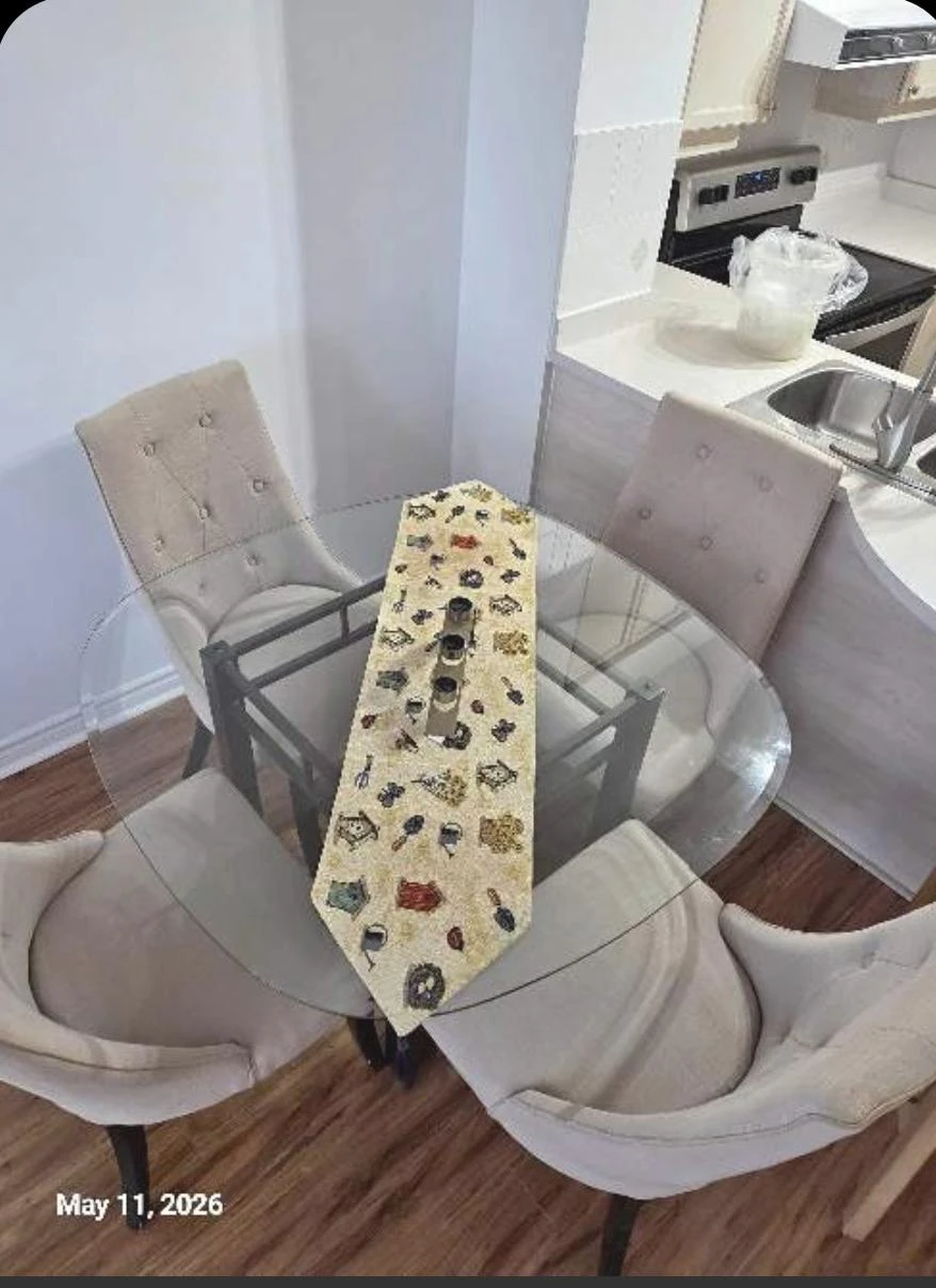 MOVING OUT SALE-Glass dining table with chairs