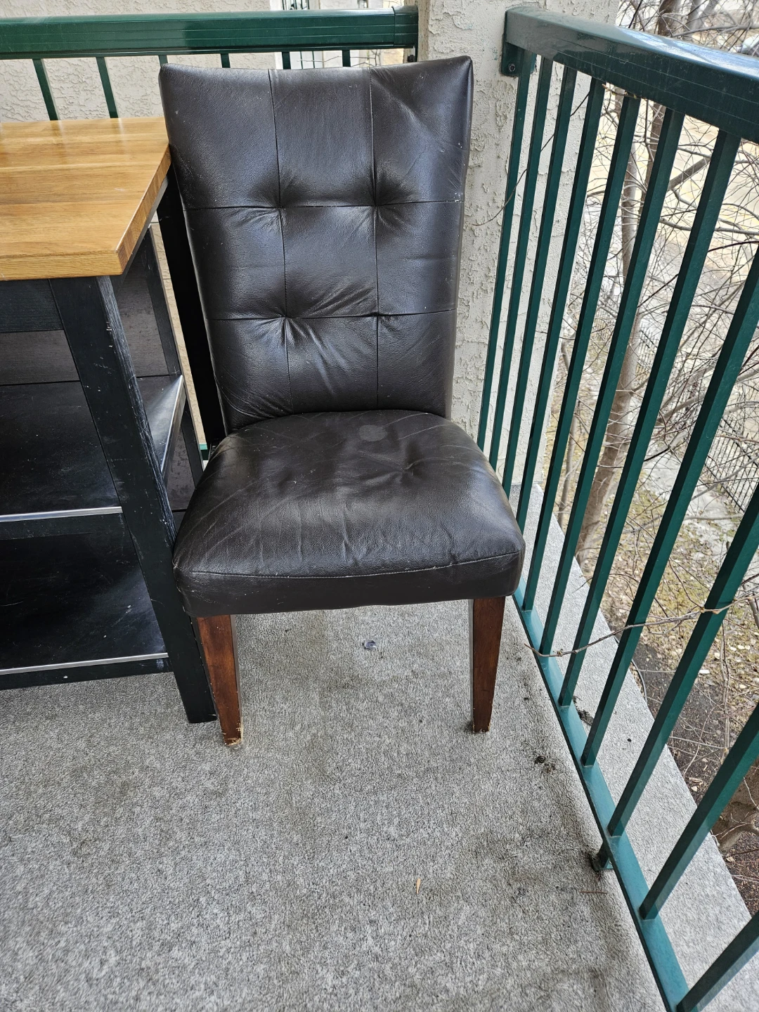 6 brown leather dining chairs.