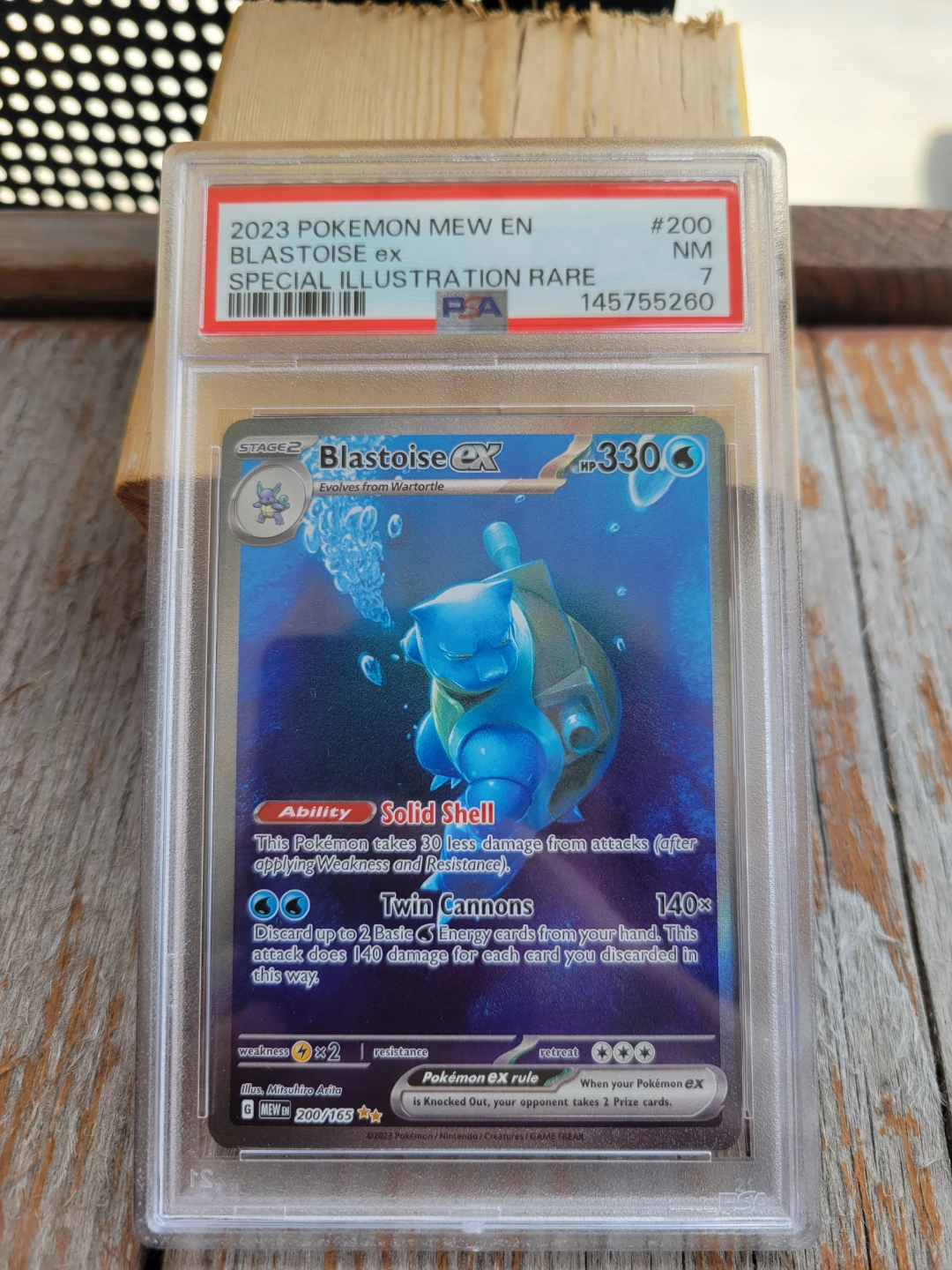 Blastoise ex 151 PSA 8 and 7.