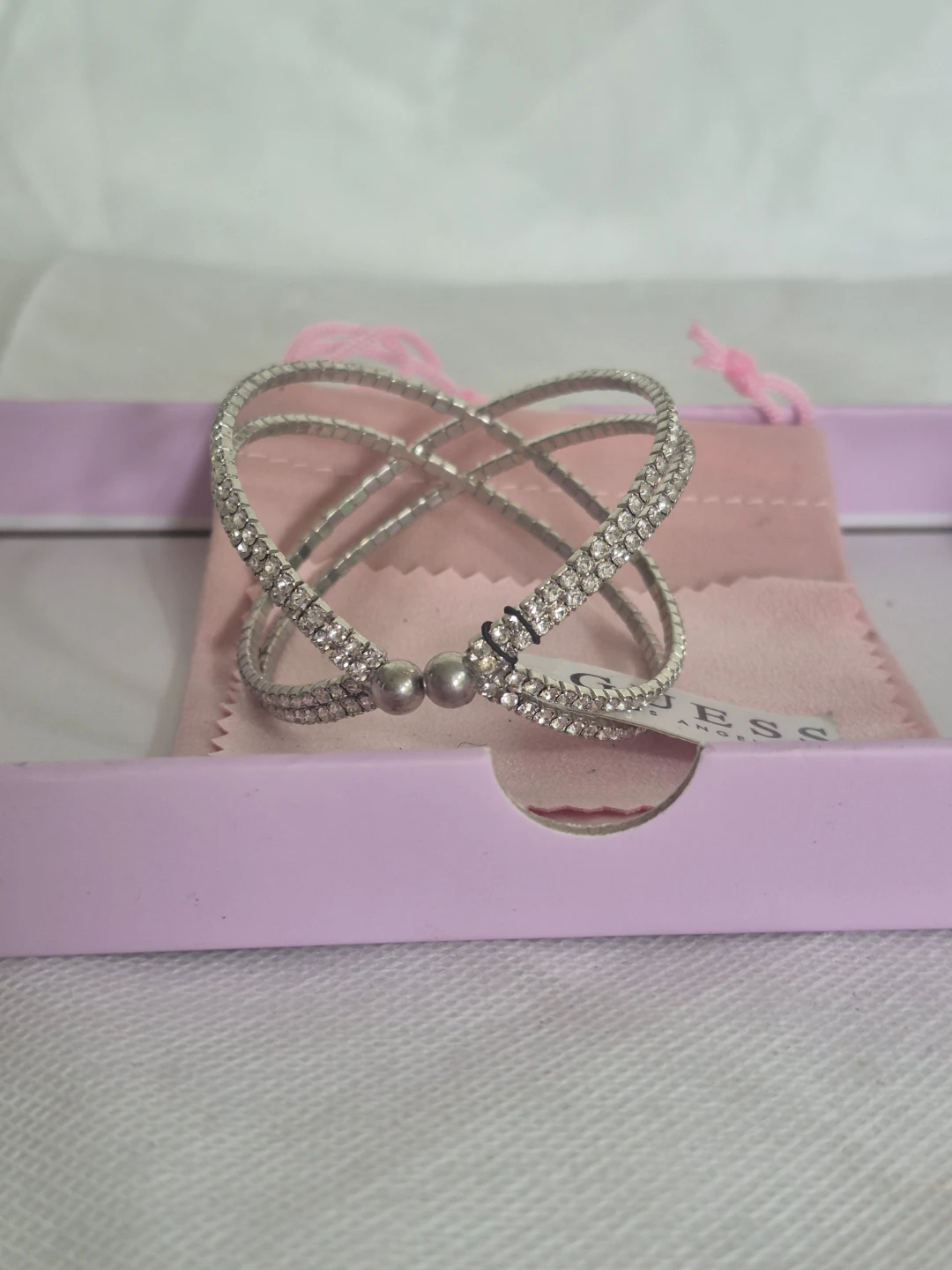 Guess Silver Tone Crystal Crossover Bangle Bracelet
