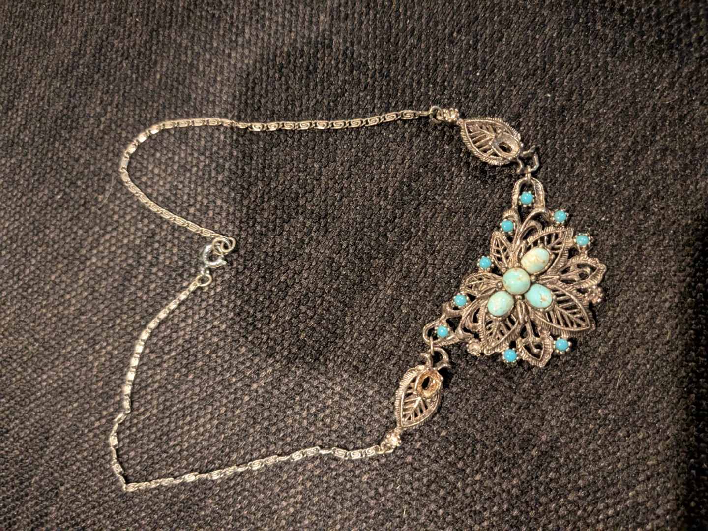 Silver-tone necklace with turquoise accents