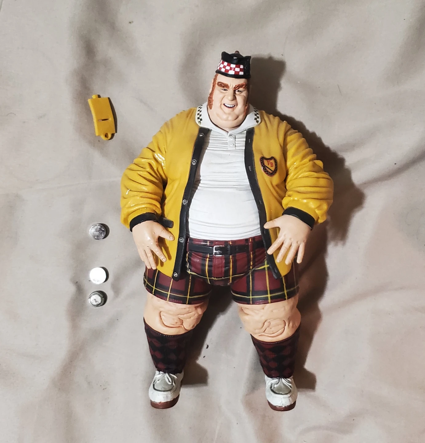 Action Figure with Yellow Jacket and Plaid Kilt