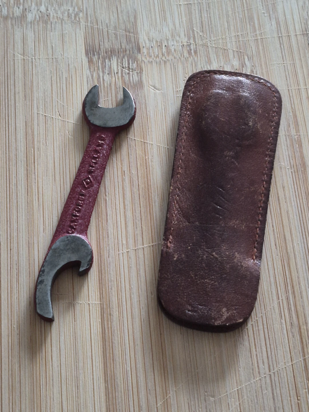 Vintage Combination Bottle and Can Opener with Leather Pouch