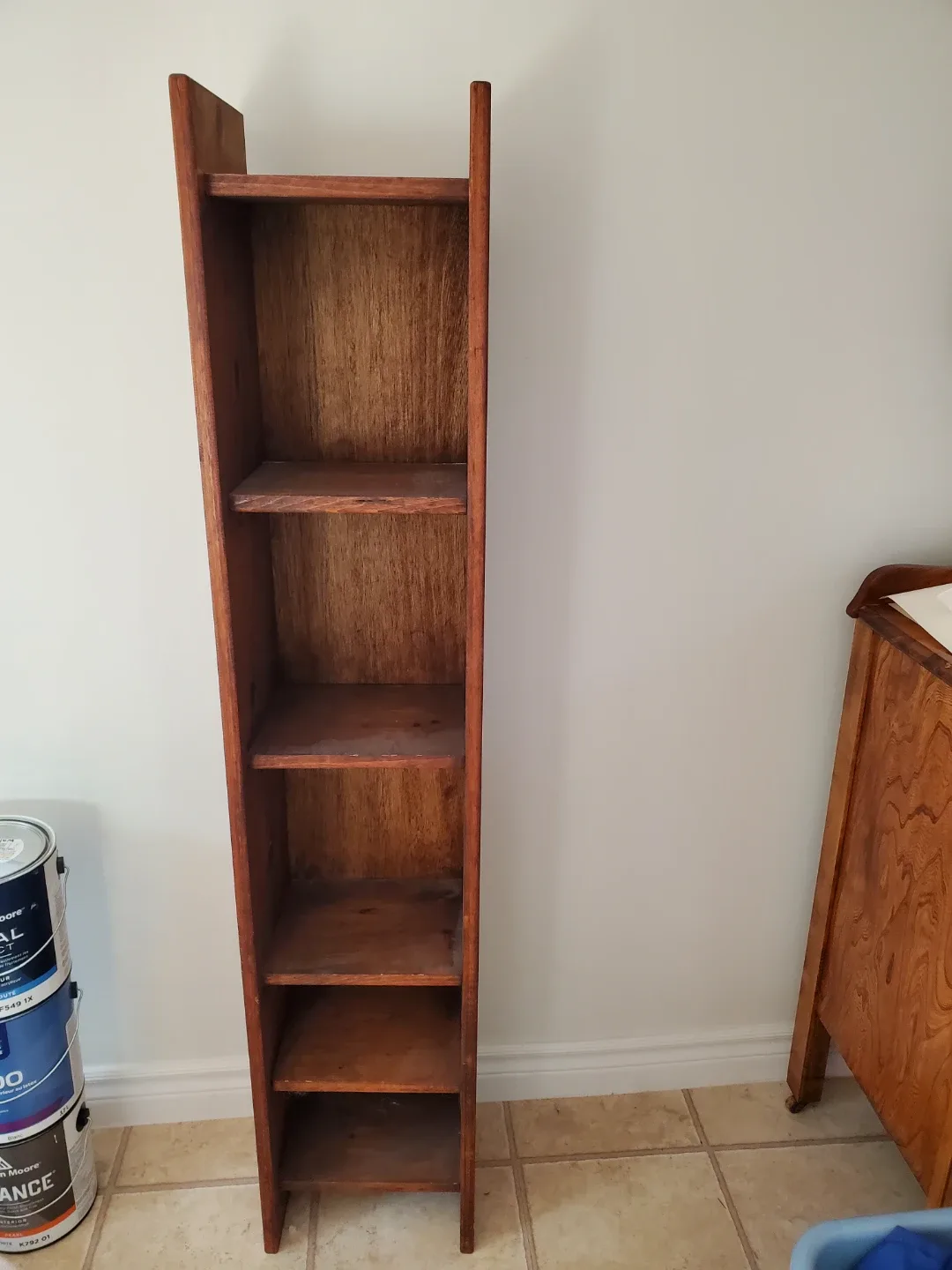 Wood shelf. 57" H x 11.5" W x 9.5" D