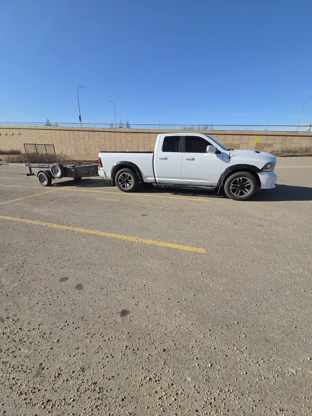 White Ram Pickup Truck with Trailer