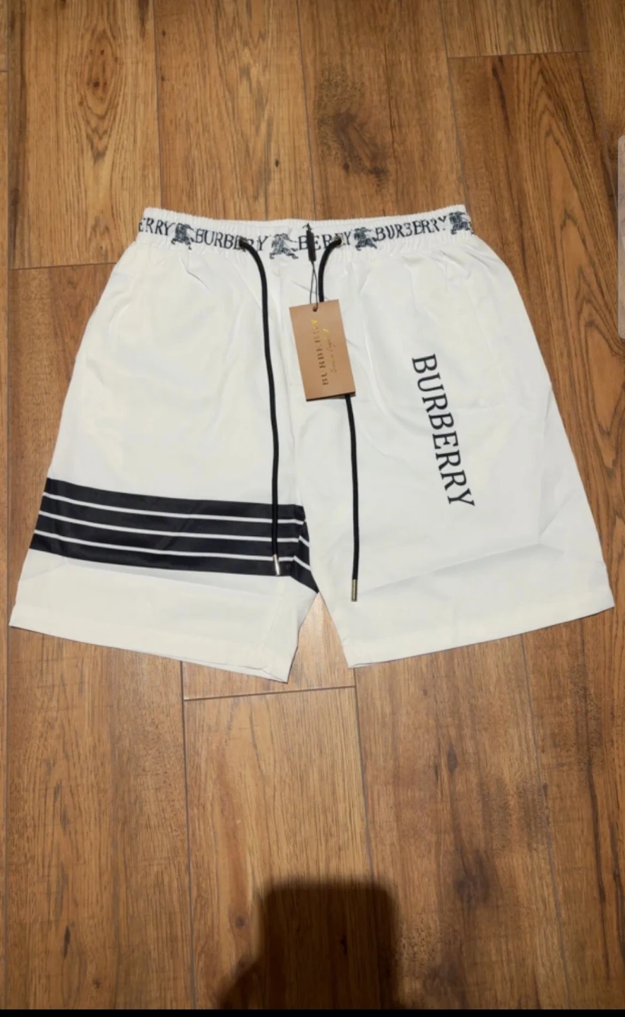 Burberry White Shorts with Black Stripe Detail