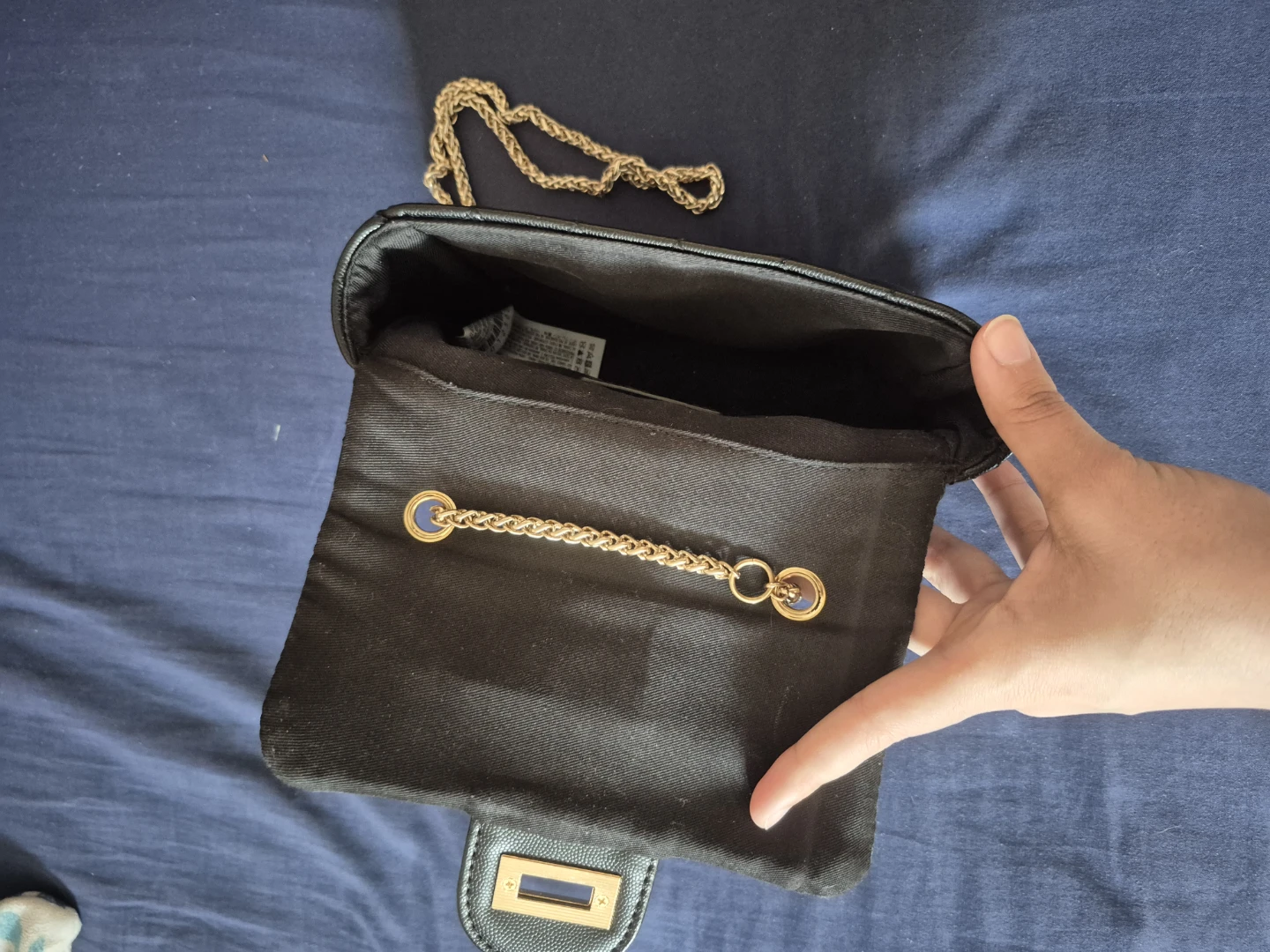 Quilted black mini purse with gold chain - photo 2