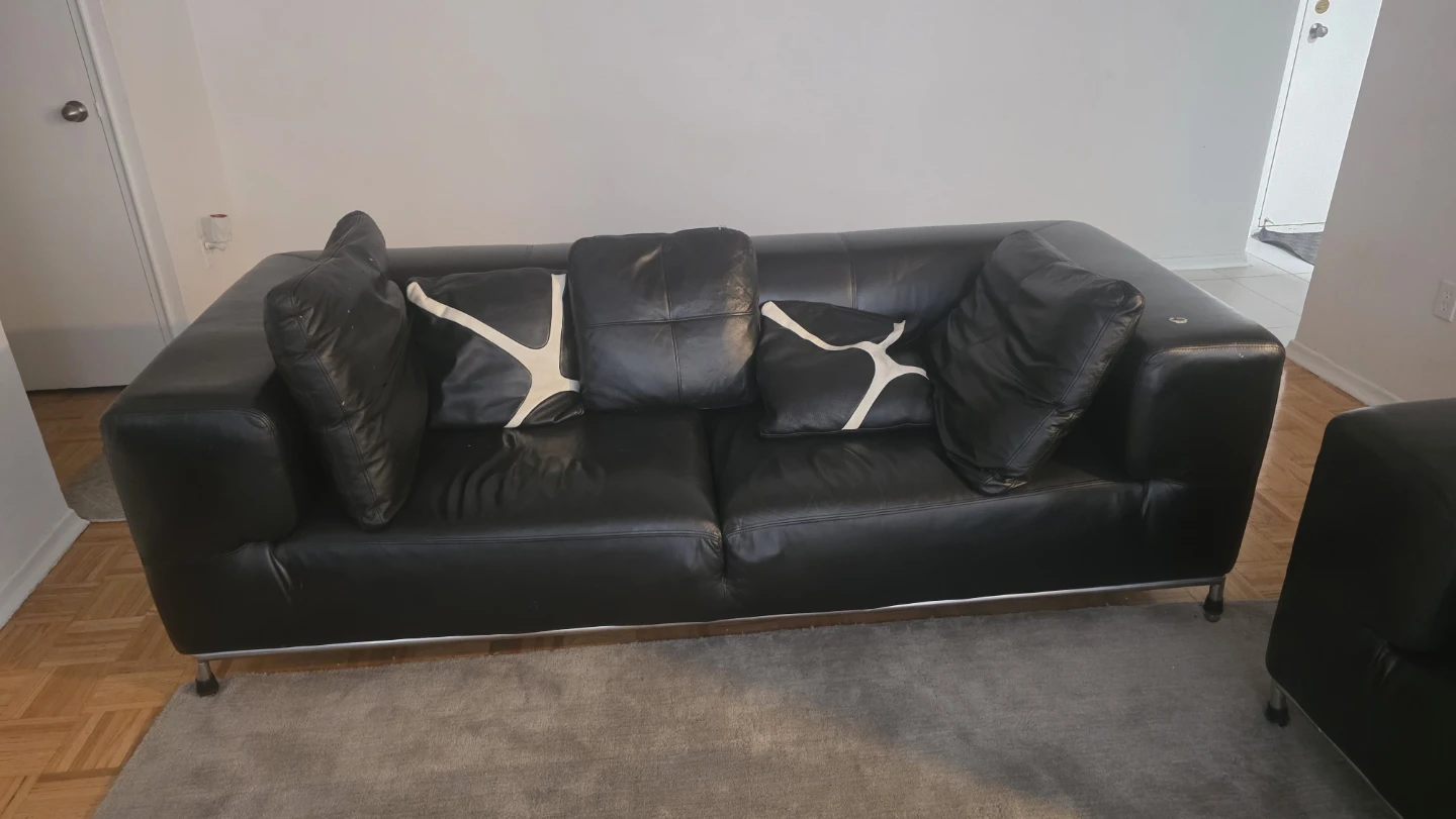 Black Leather Sectional Sofa with Pillows - photo 2