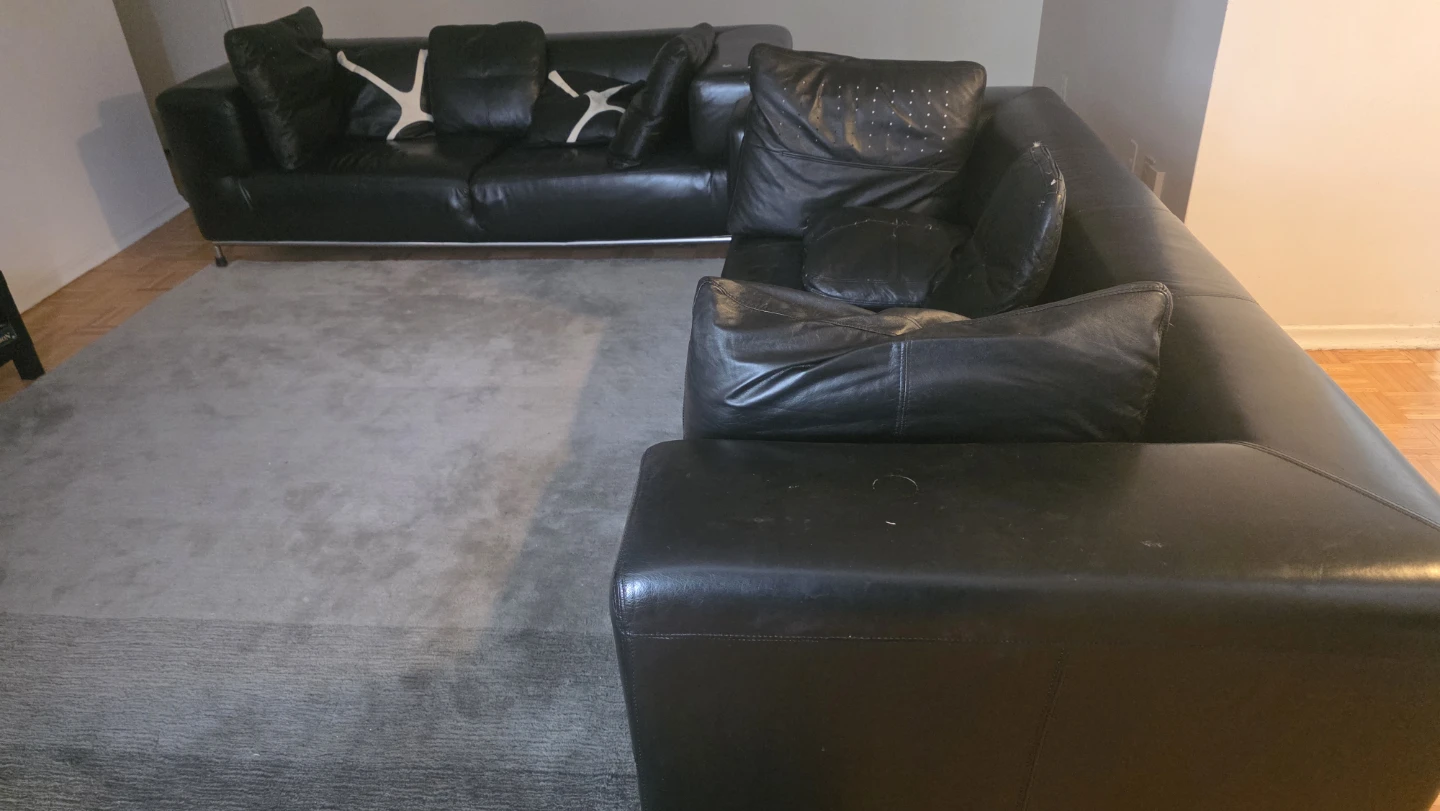 Black Leather Sectional Sofa with Pillows - photo 3