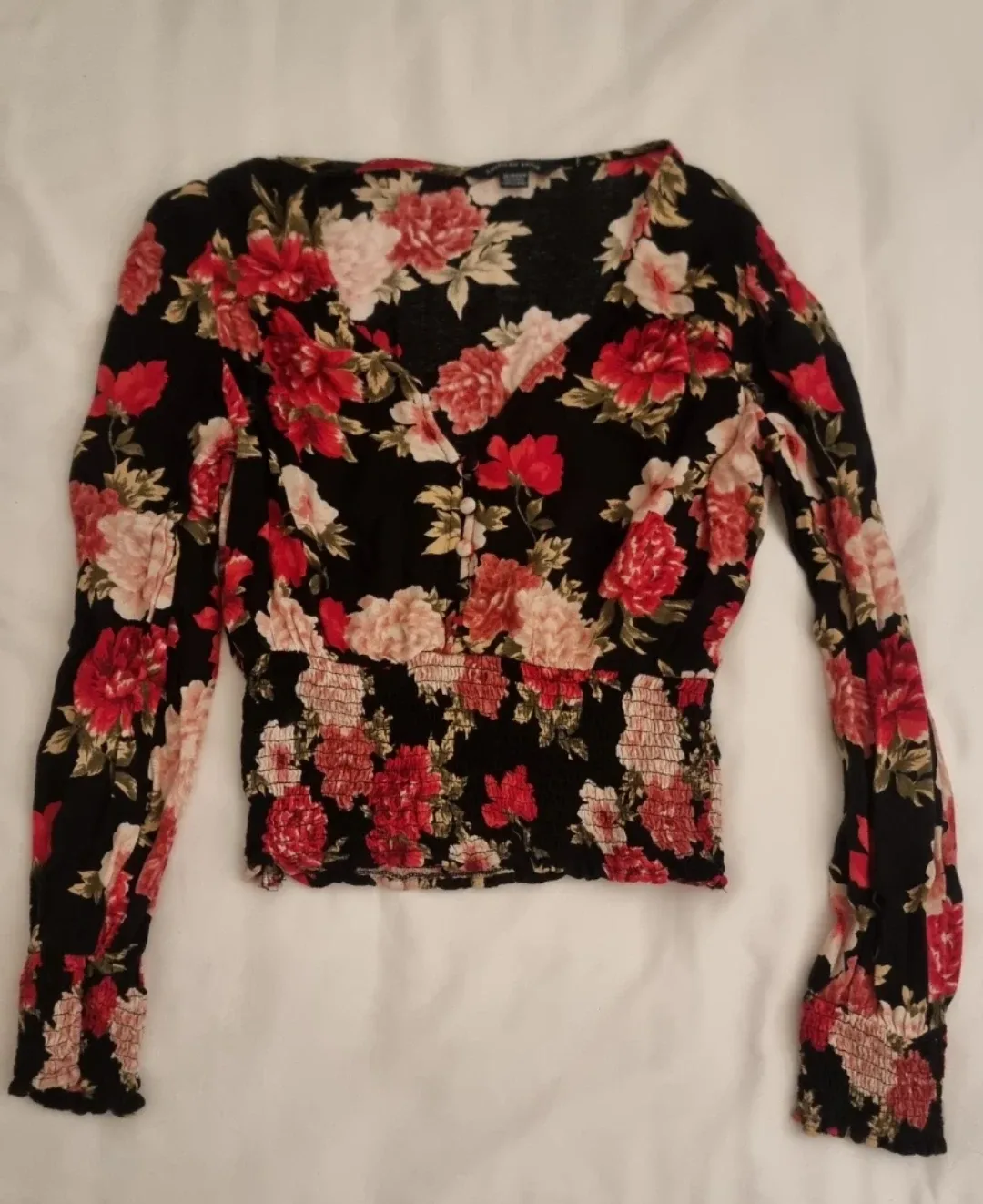 American Eagle floral smocked long sleeve top