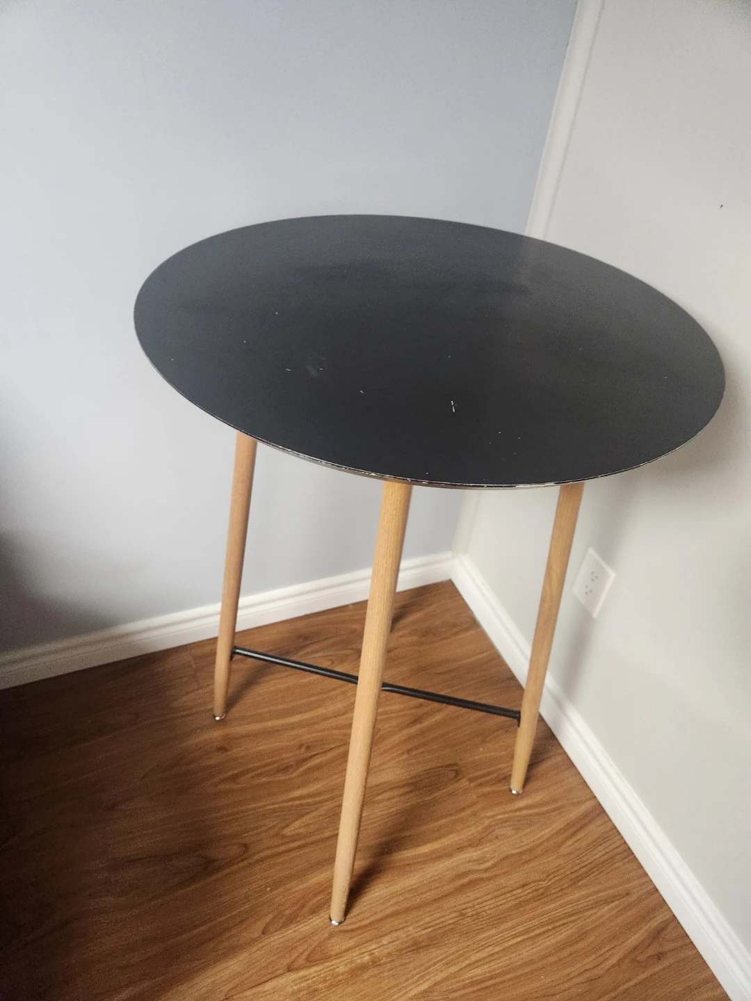 Round Black Table with Wooden Legs