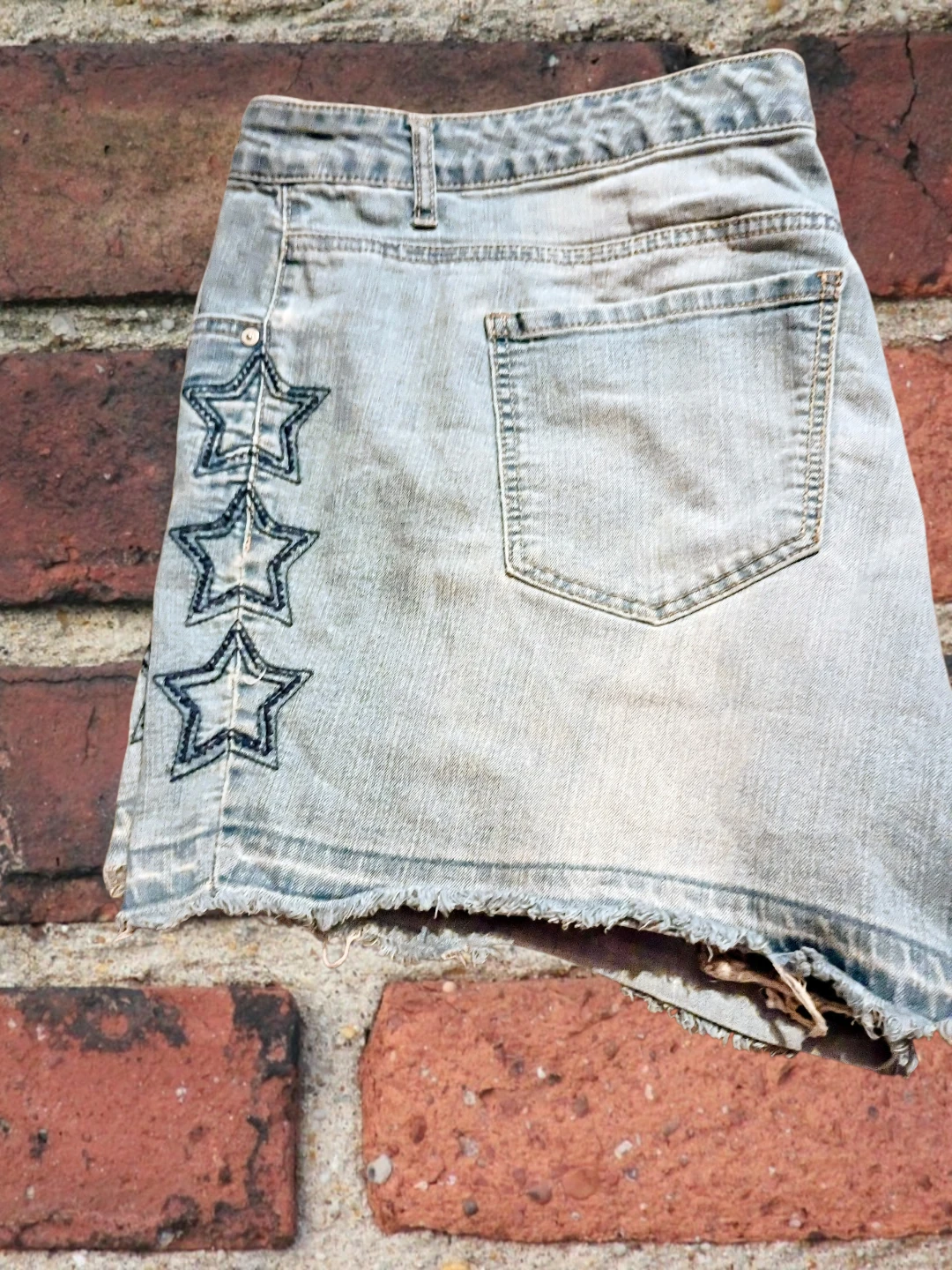 Women's jean shorts with stars design on each side by size 20