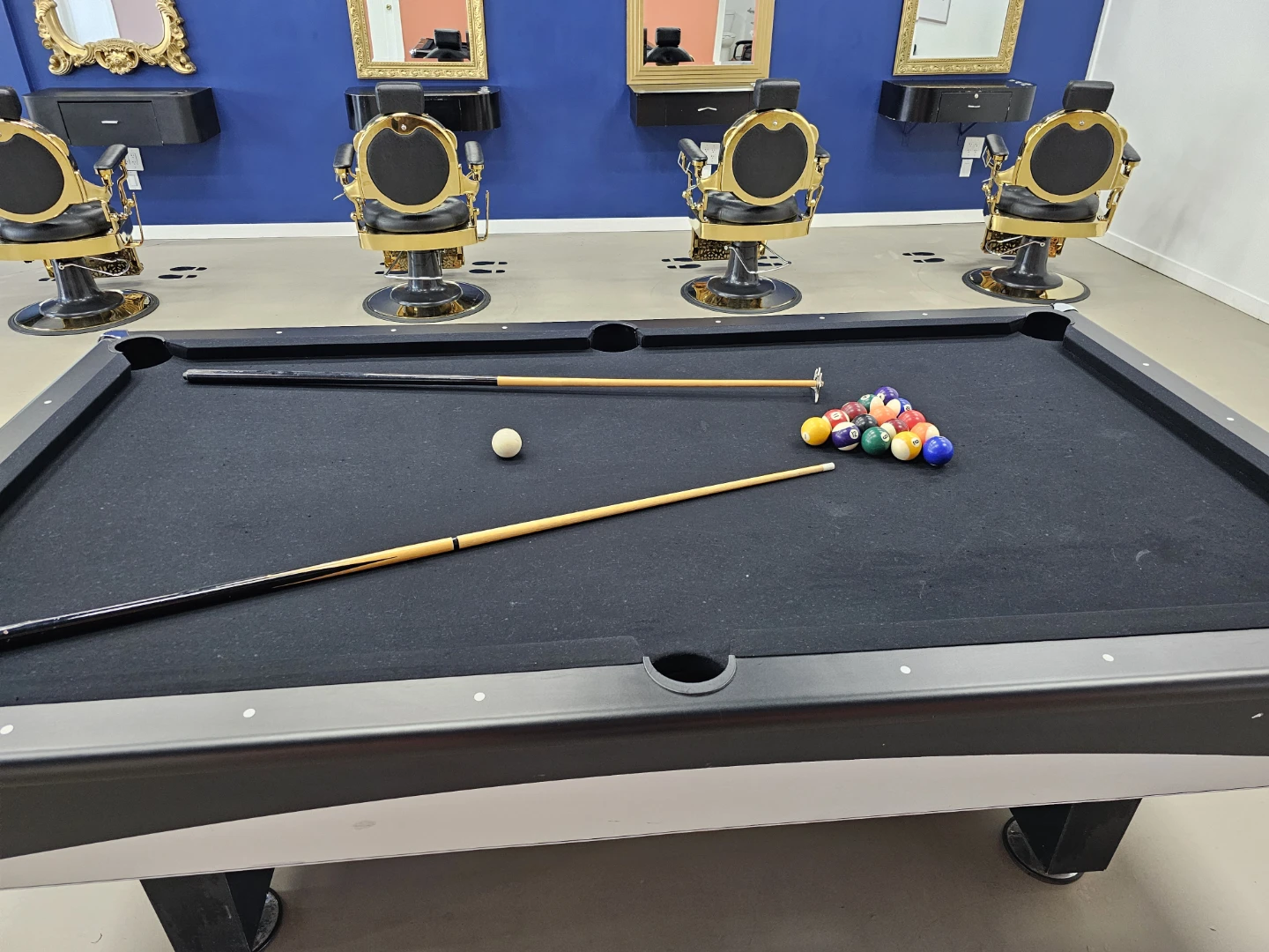 $900 pool table gently used with custom cue rack