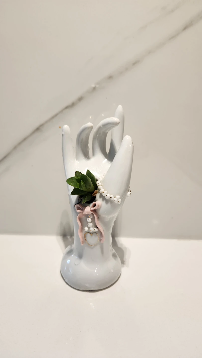 Upcycled porcelain hand planter with succulent