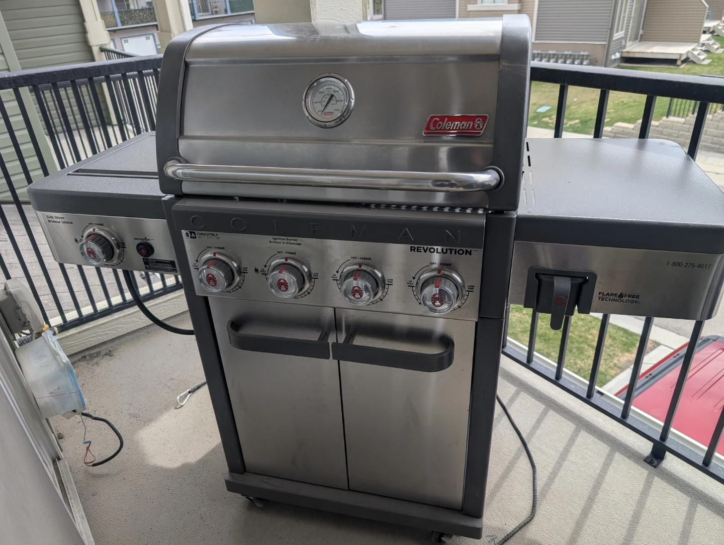 Coleman Revolution 4-Burner Propane Grill with Side Burner