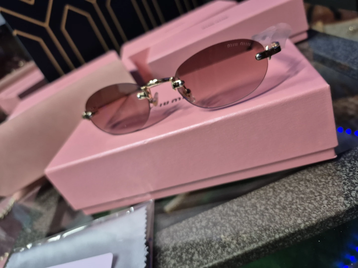 Miu Miu Oval Rimless Sunglasses Pink Gradient