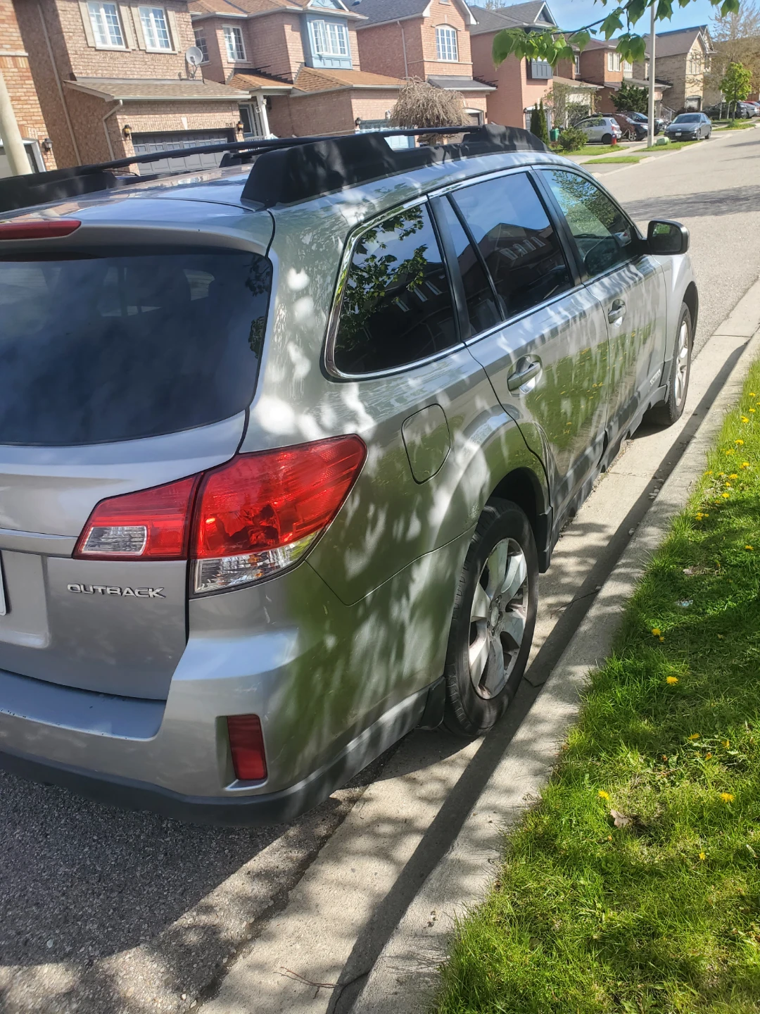 Silver Subaru Outback - photo 2