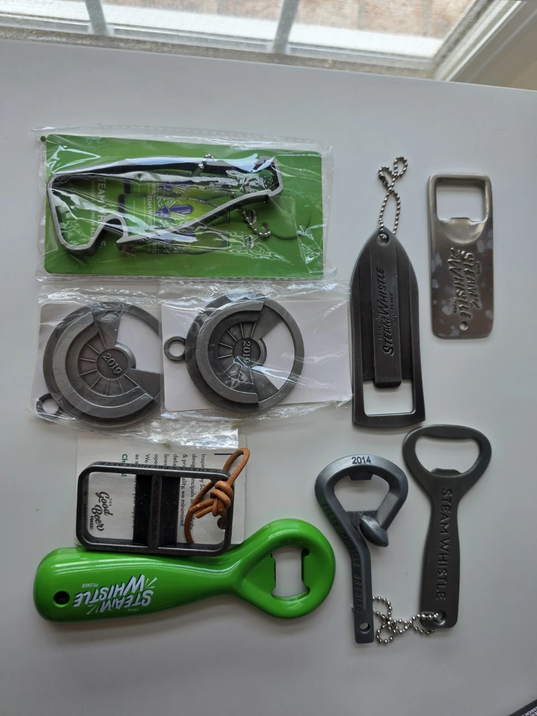 Steam whistle bottle openers