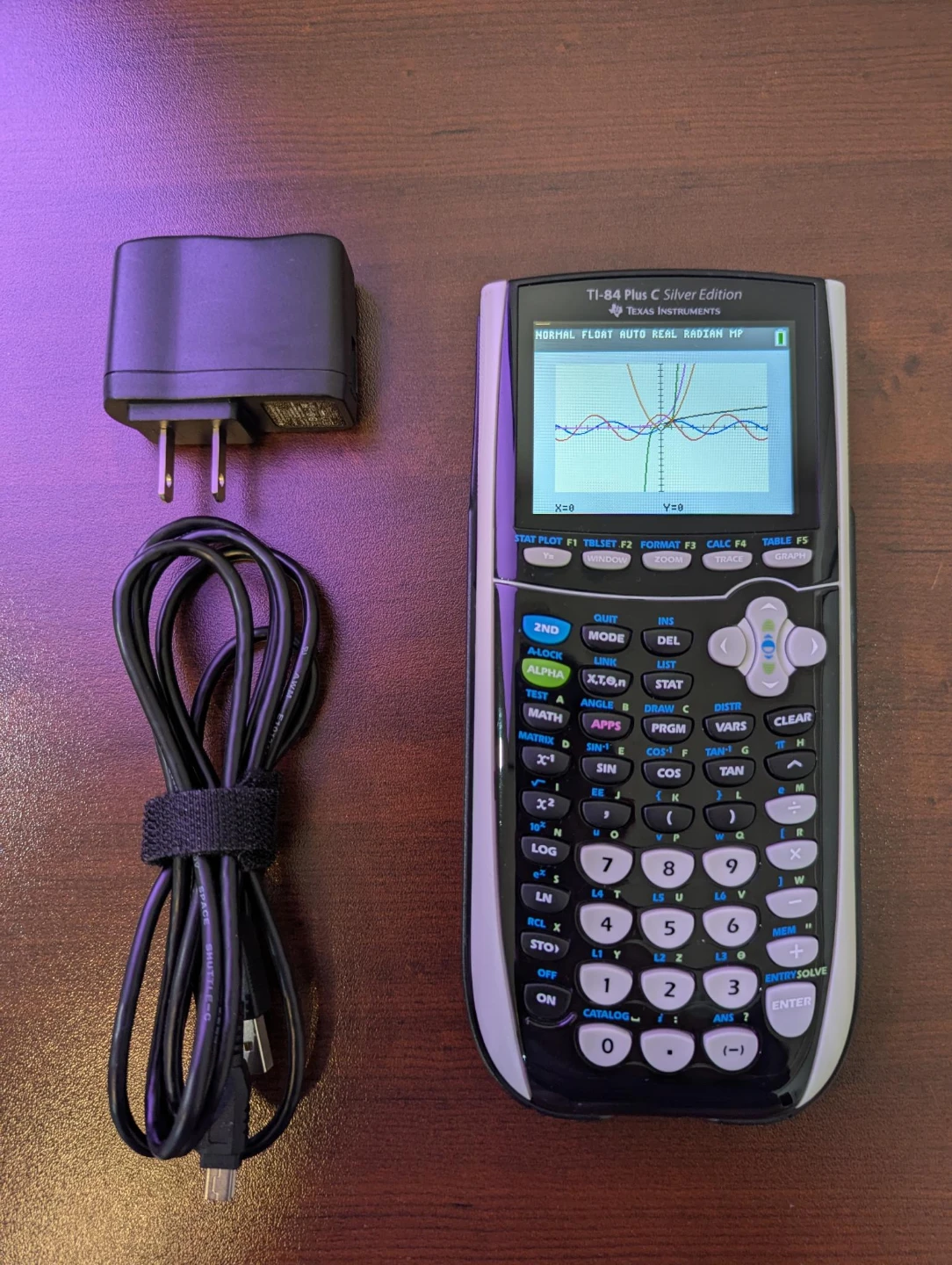 TI-84 Plus C Silver Graphing Calculator w/ color backlit display