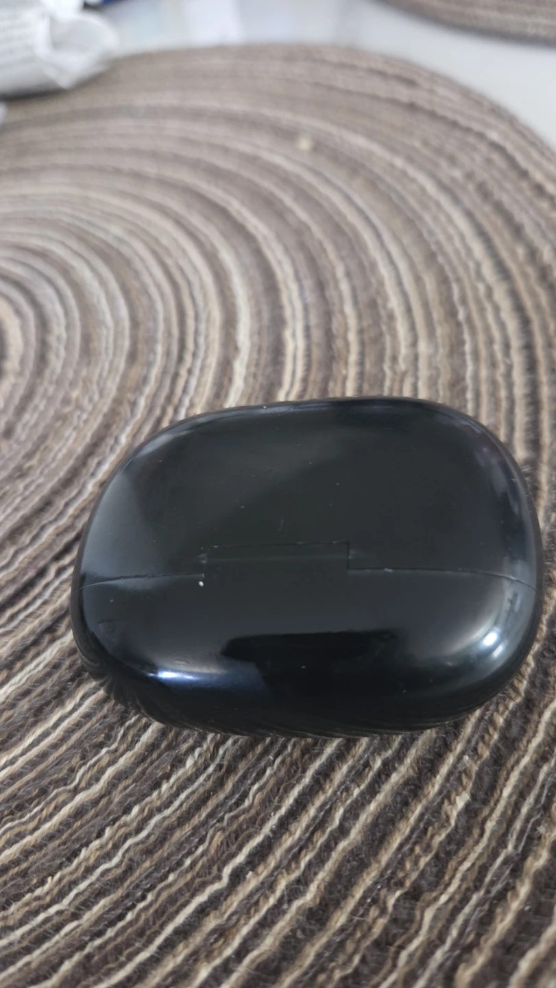 Black wireless earbuds charging case