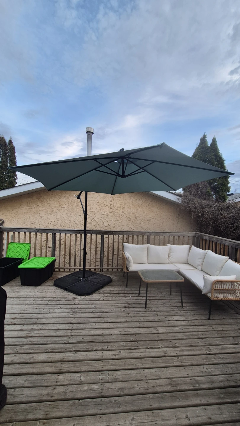 Teal Patio Umbrella with Base and patio set.