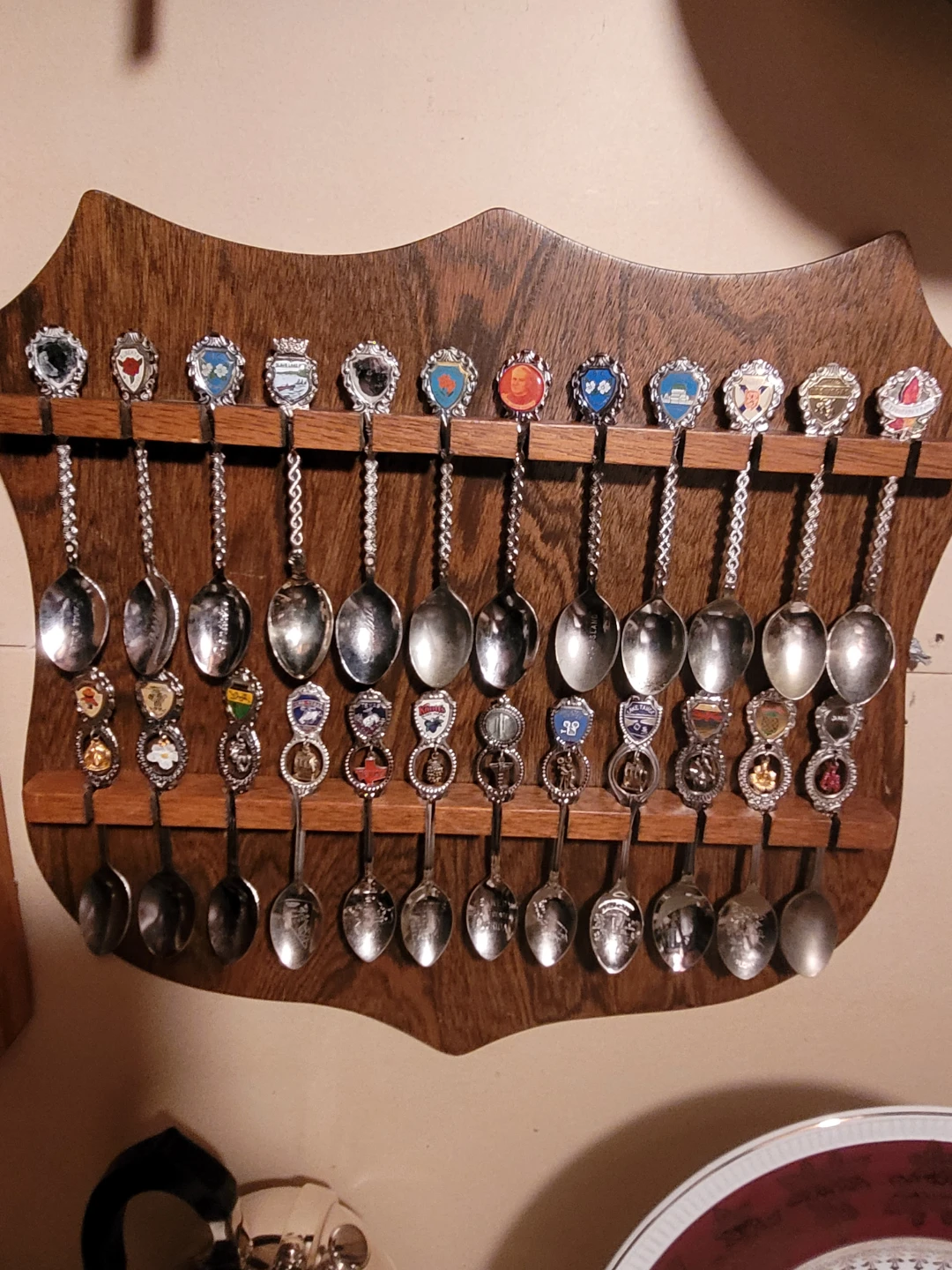 Display of 24 Souvenir Spoons