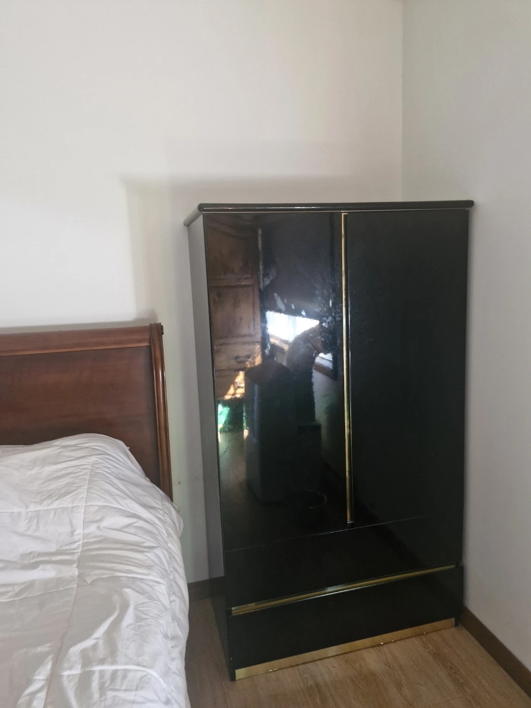 Black Wardrobe with Gold Accents