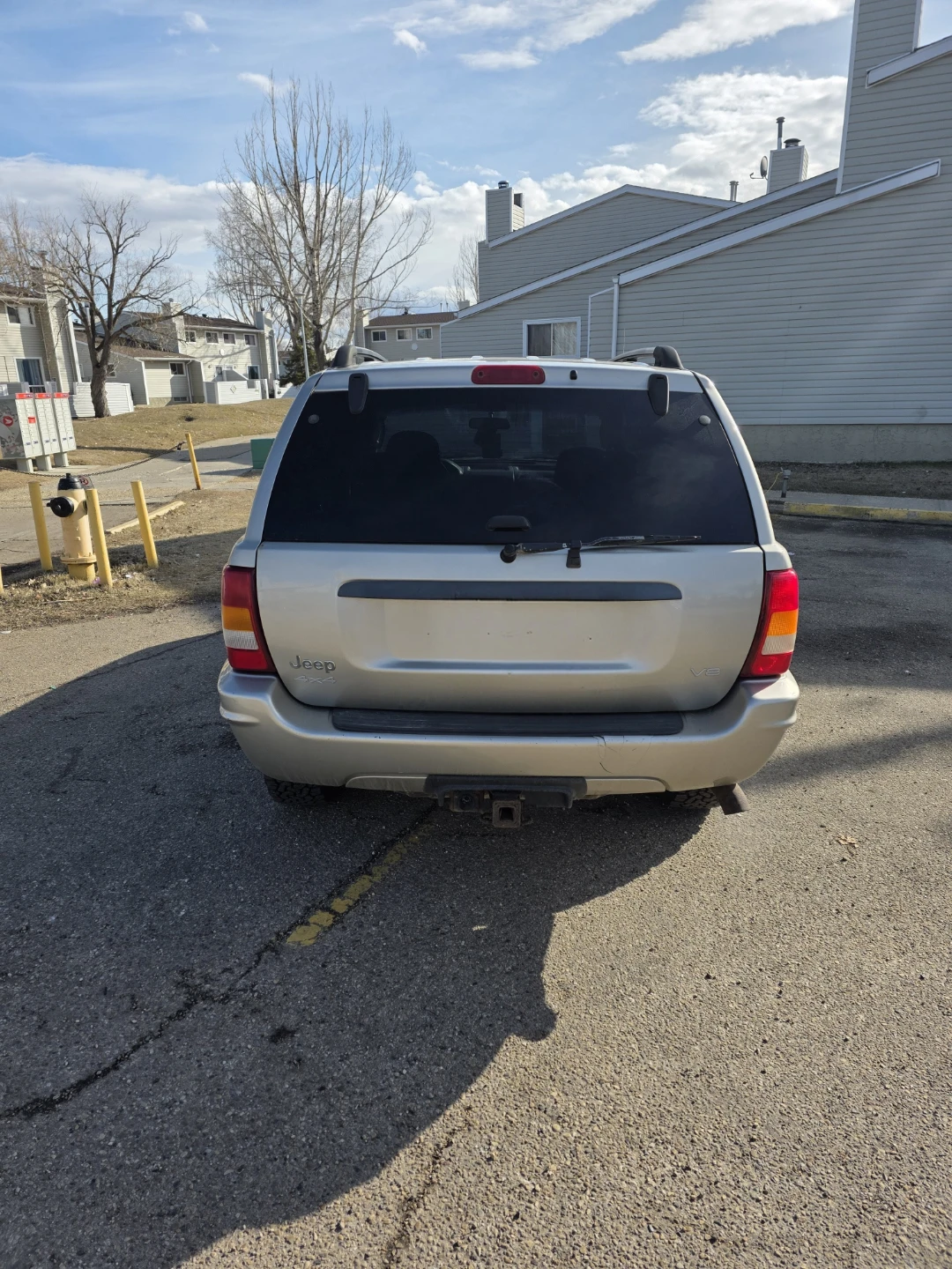 Gold Jeep Grand Cherokee SUV - photo 3