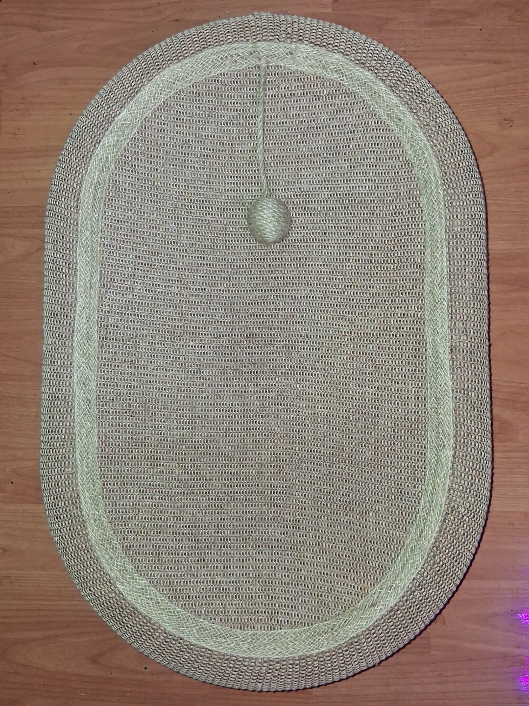 Large cat scratcher bed.