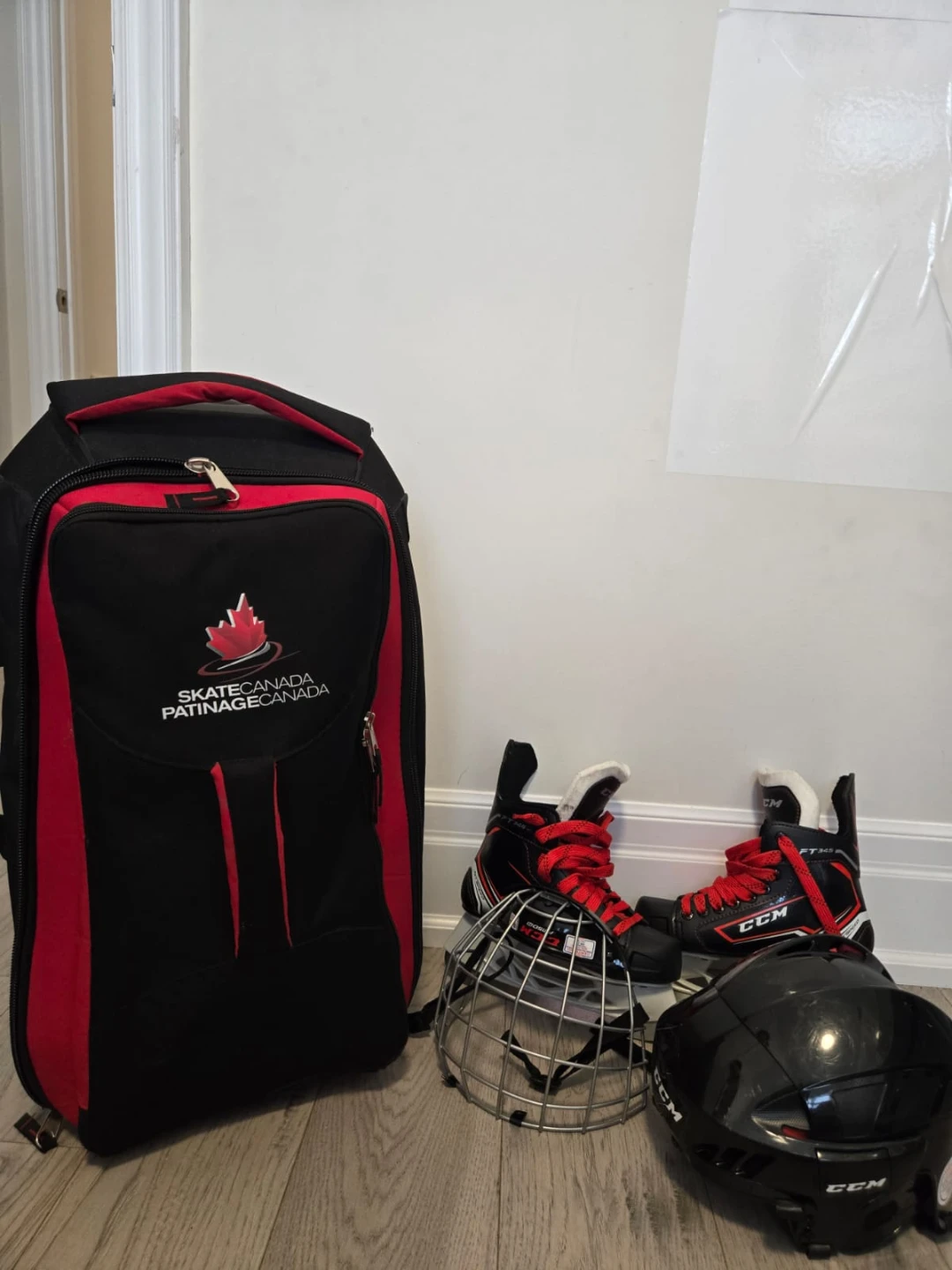 CCM Hockey Skates, Helmet, and Skate Canada Bag