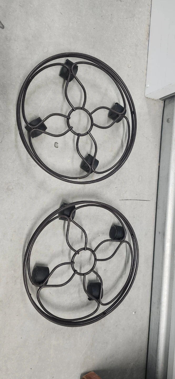 Metal flower stand with wheels of 2, one for $10