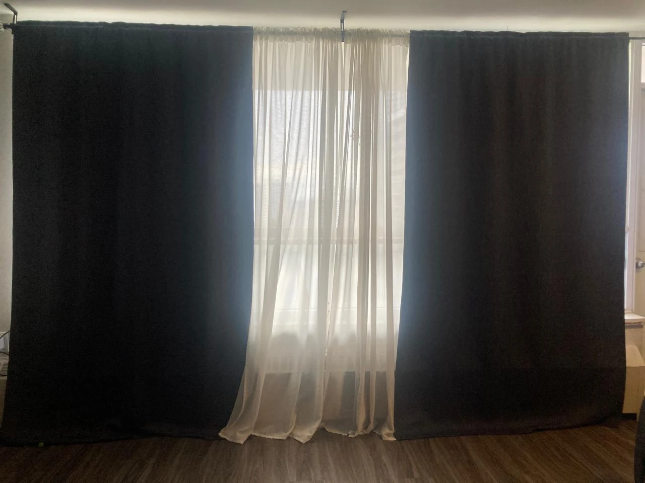 Grey and sheer white curtains