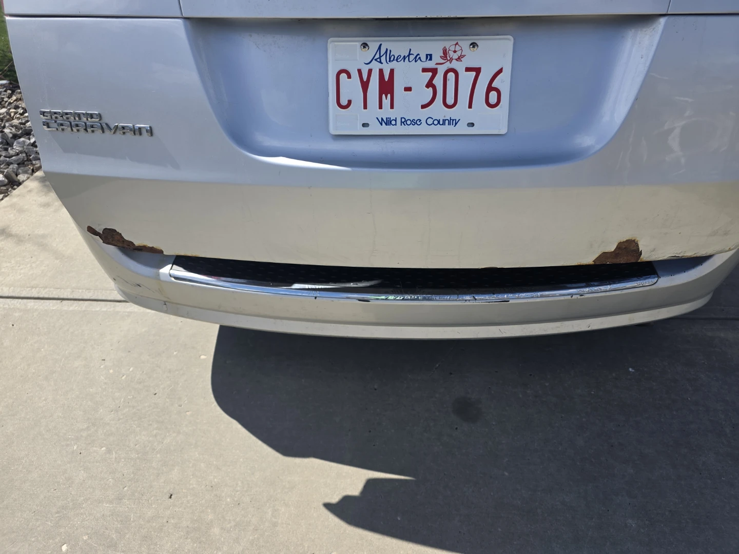 Silver Dodge Grand Caravan