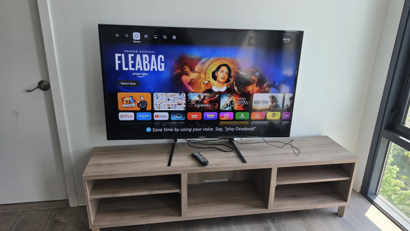 56” Samsung HD TV + Large Wooden TV Stand + Fire Stick - photo 2