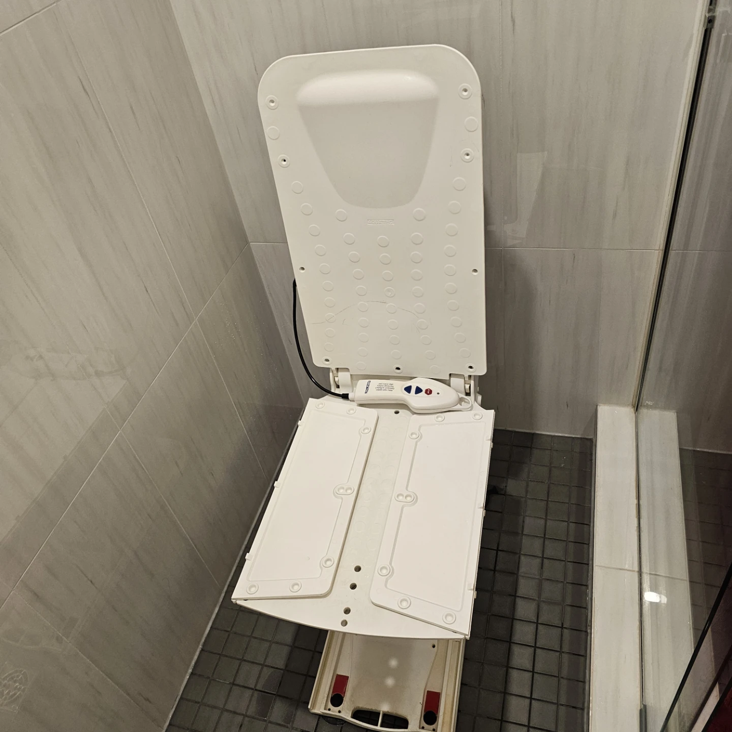 Aquatec reclining powered bath Chair with remote