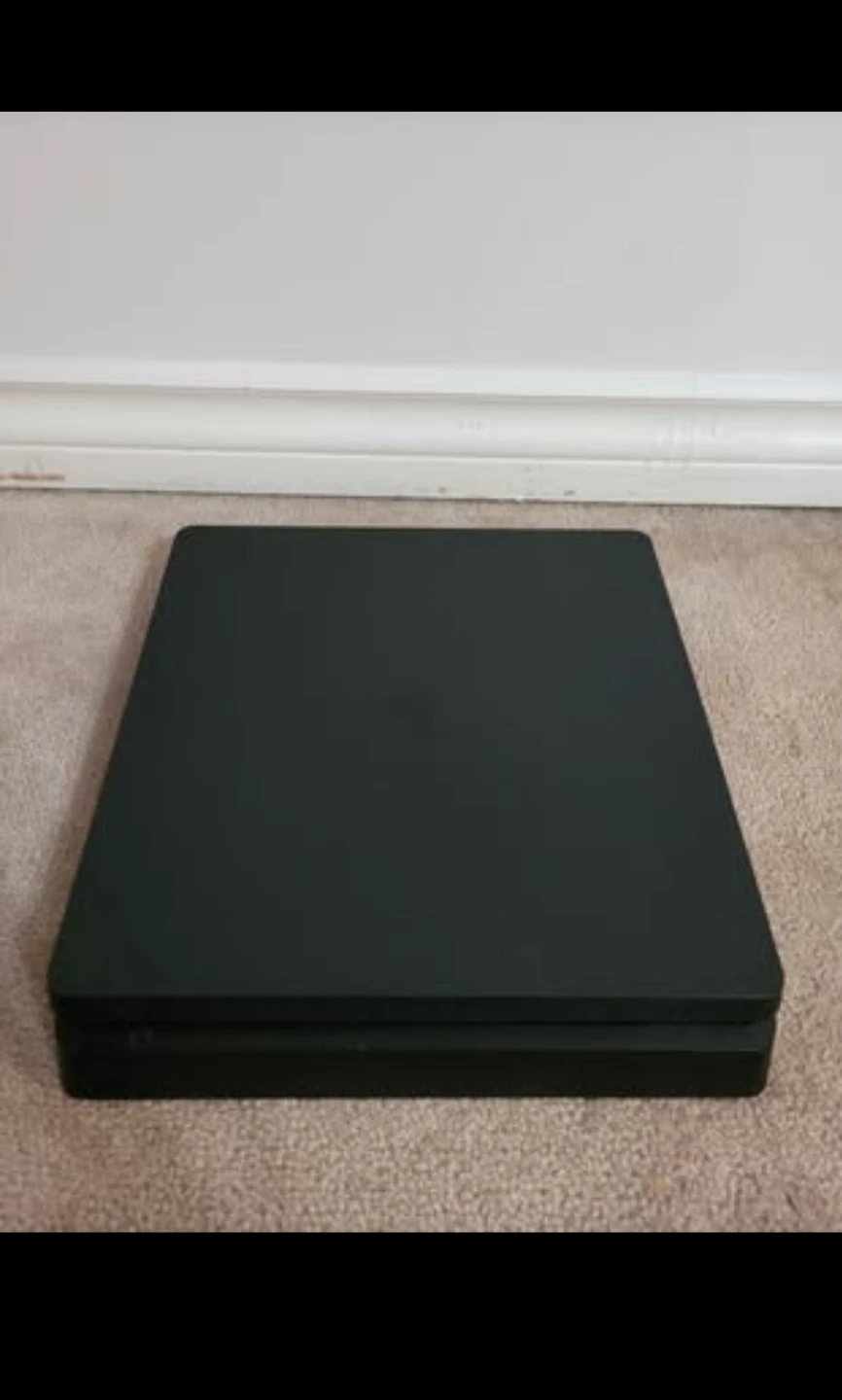 For Sale: PS4 Slim 1TB + 2 Games (FC24 & GTA V)