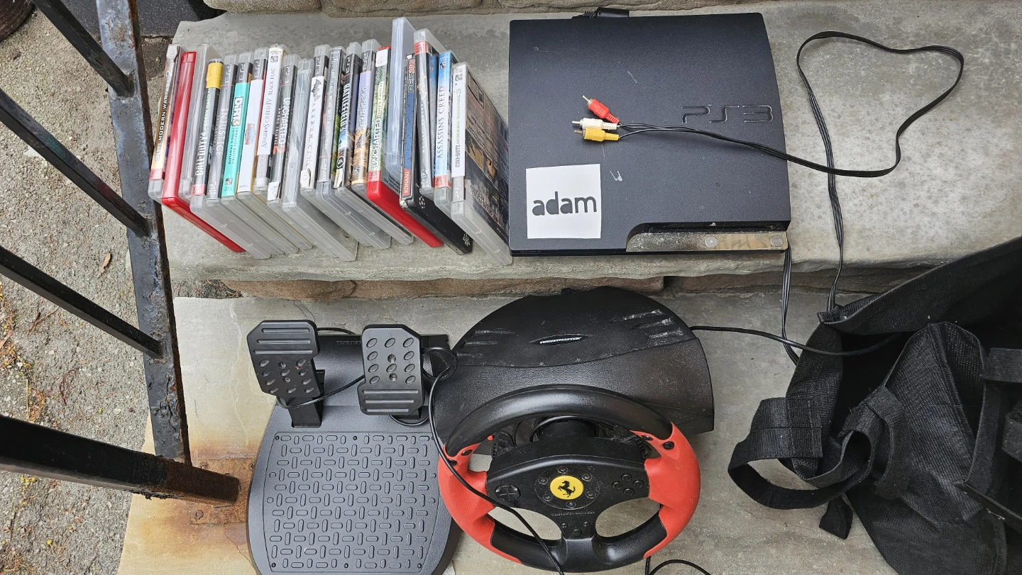 PlayStation 3 Bundle with Games, Controllers, and Racing Wheel - photo 2