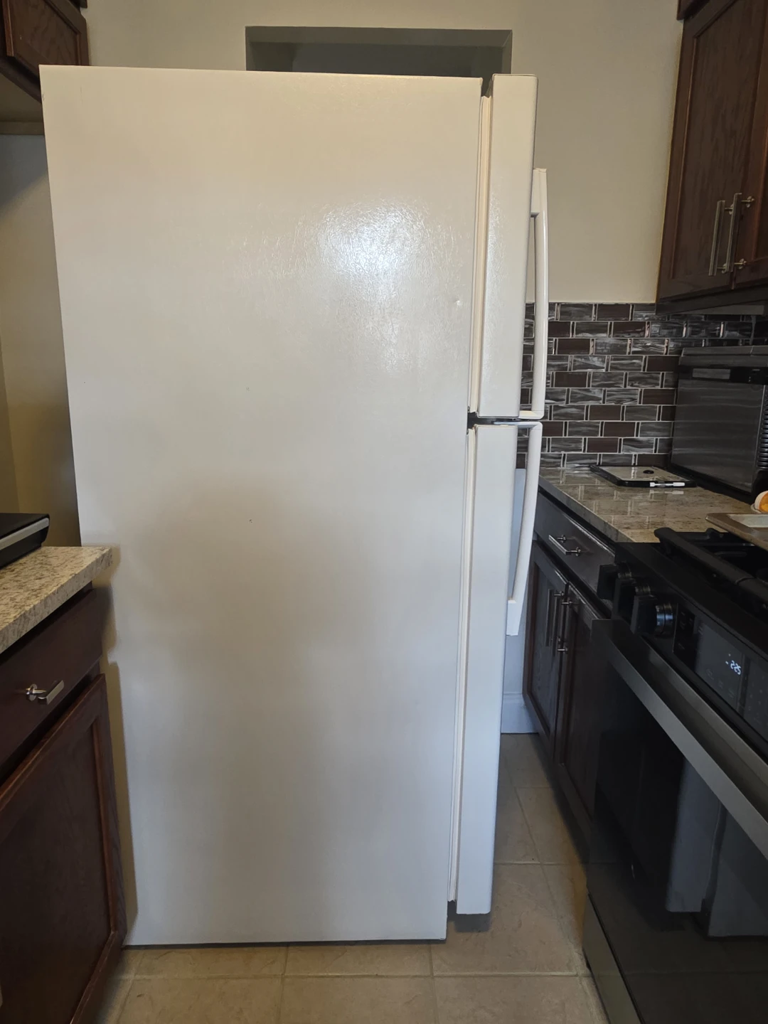 GE Refrigerator Top Freezer - photo 2