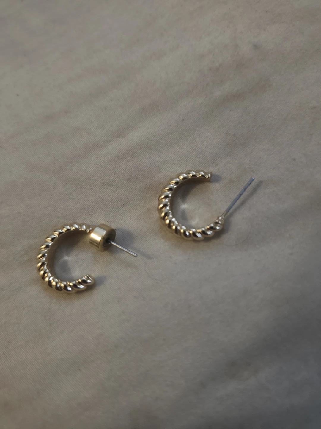 Gold Tone Twisted Hoop Earrings