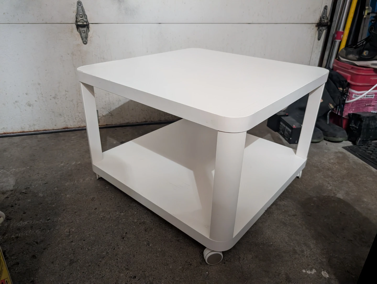 White Two-Tiered Ikea Coffee Table with Wheels
