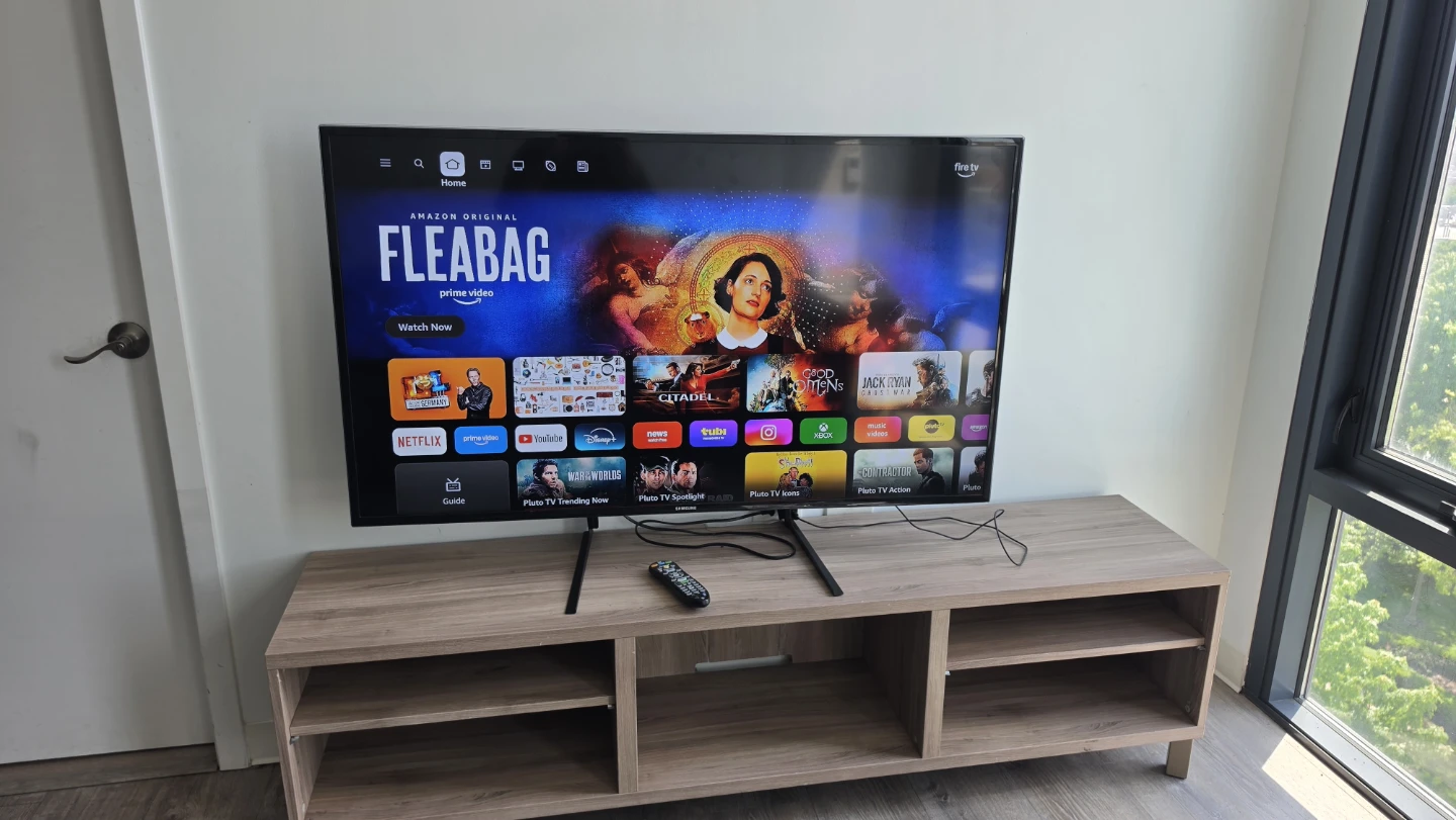 56” Samsung HD TV + Large Wooden TV Stand + Fire Stick