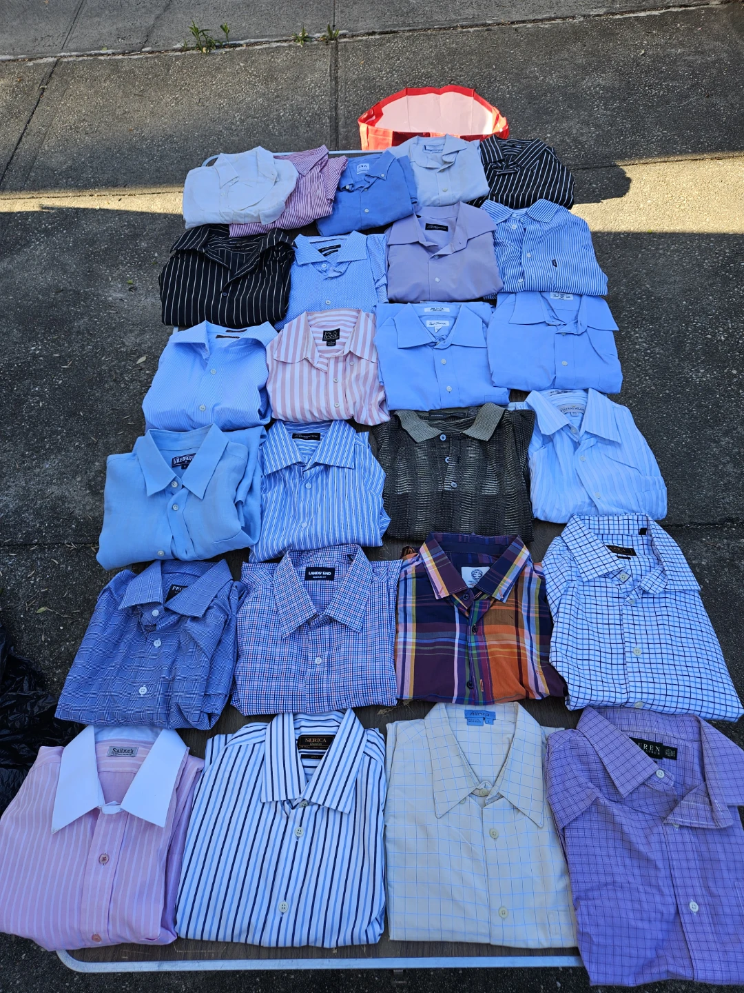 25 mens used shirts . Large