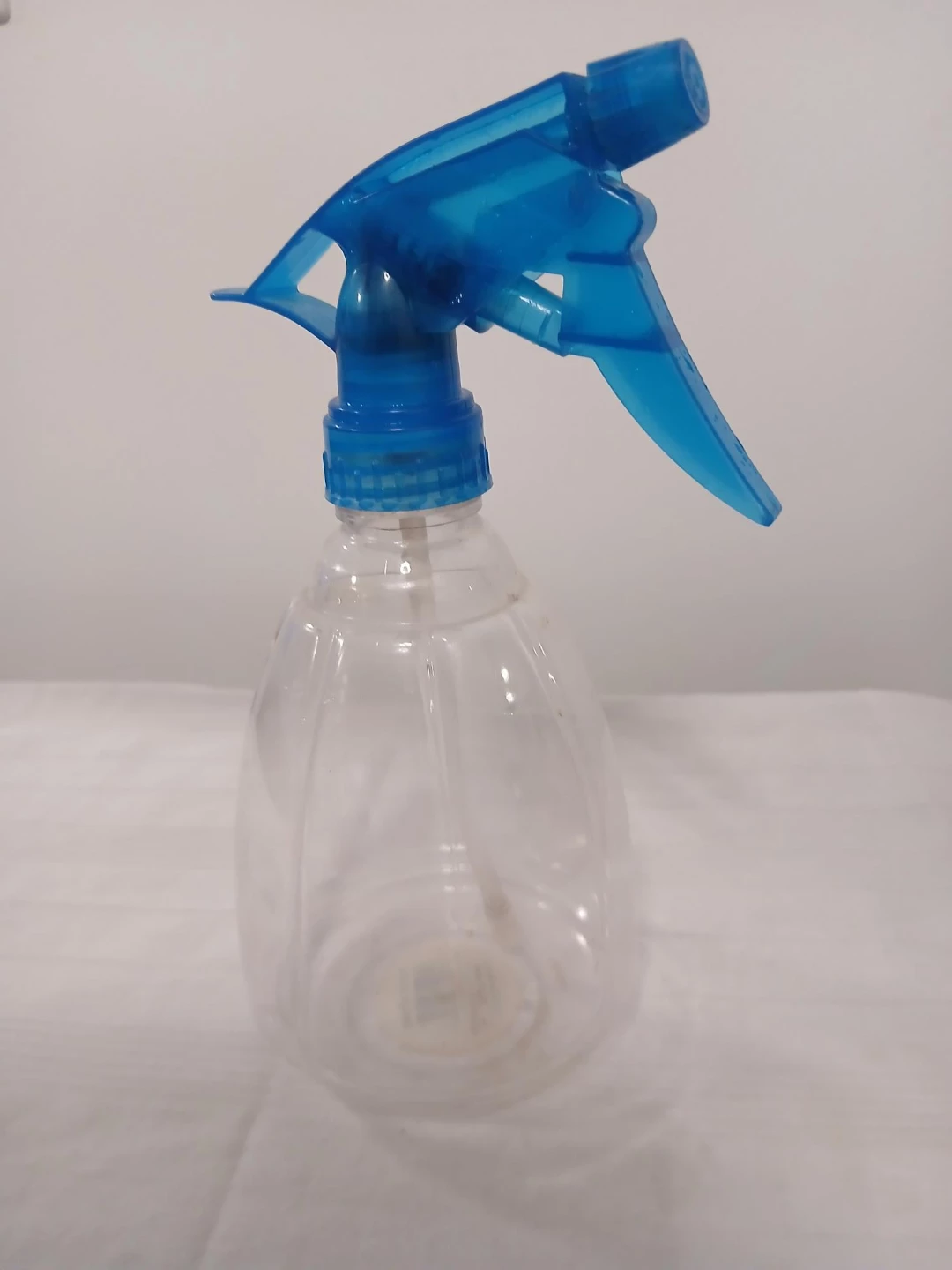 Clear Spray/mister Bottle with Blue Trigger - 7"H. Pick up only.
