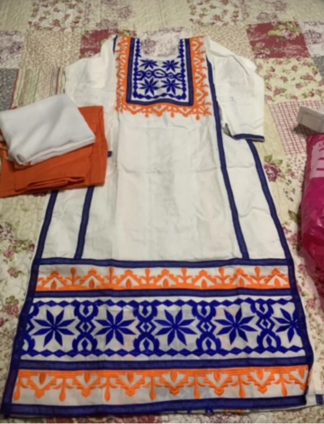 White Kurti with Orange and Blue Embroidery
