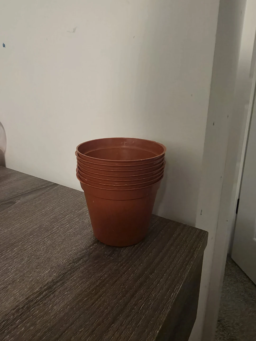 Pack of 7 terracotta plastic plant pots