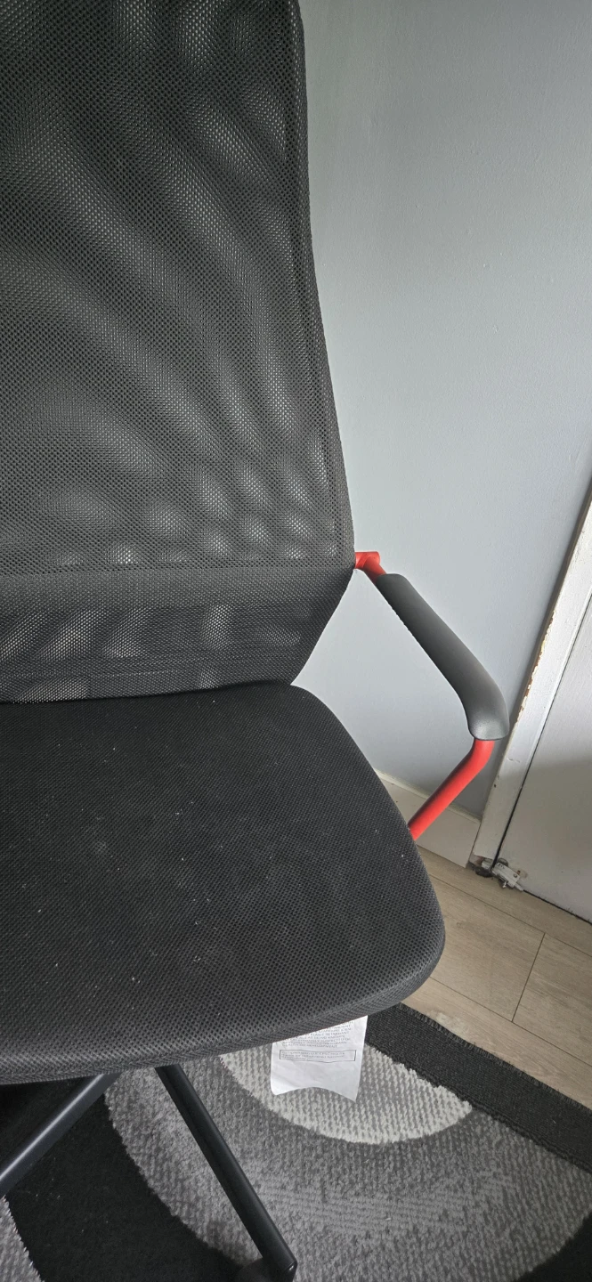 Black office chair with red accents